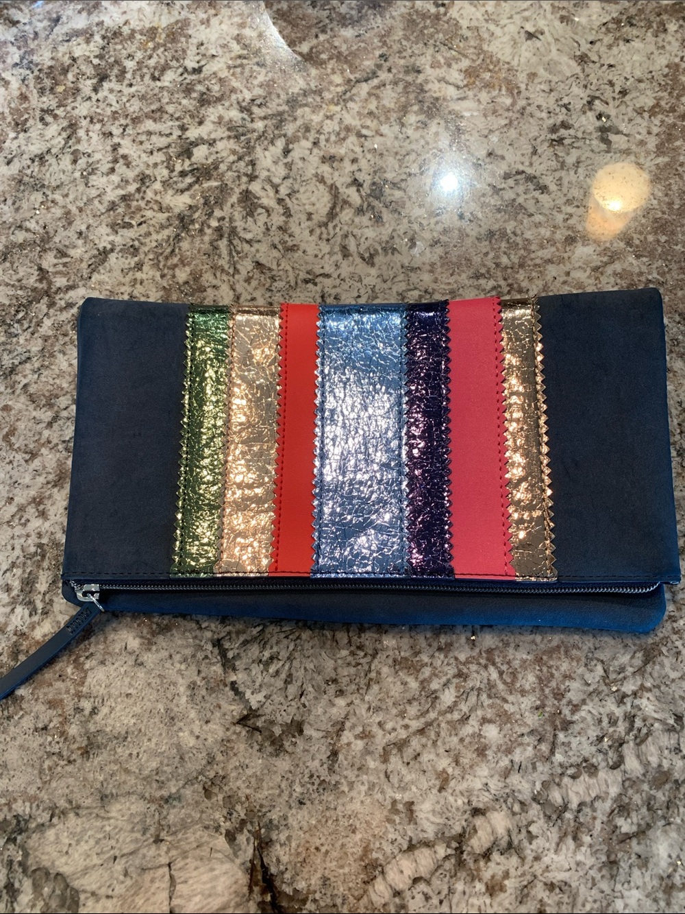 Navy Fold-Over Clutch with Multicolor Metallic Stripes